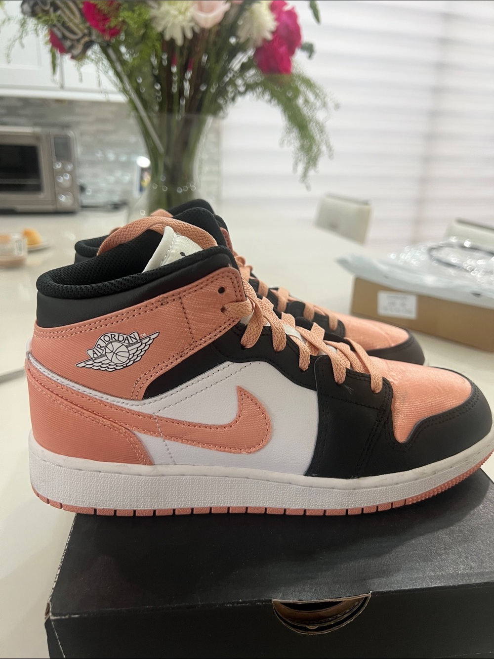 Jordan Women's Mid-Top Sneakers in Coral, Black & White